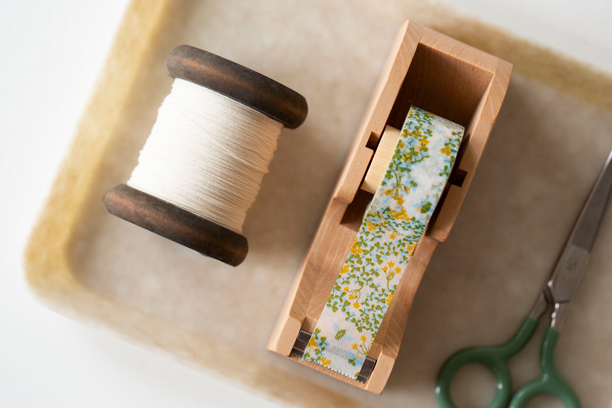 Finest Paper Yarn on New Stained Wooden Bobbin: Small